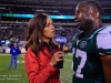 Oct 17, 2011; East Rutherford NJ, USA; SNY reporter Jeane Coakley  (left) interviews New York Jet's  linebacker Bart Scott (57) after the game against the Miami Dolphins at Metlife Stadium. The Jets defeated the Dolphins 24-6. Photo by Manish Gosalia/JetsInsider.com